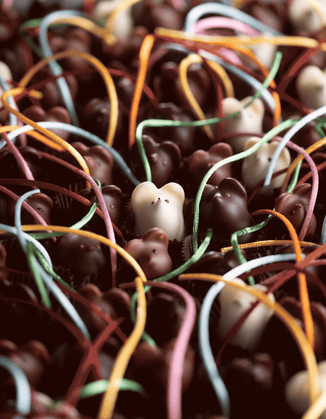Noses and eyes are hand dotted onto our Chocolate Mice