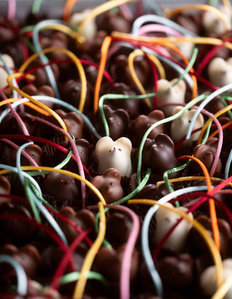 Noses and eyes are hand dotted onto our Chocolate Mice