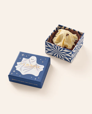 Single white Chocolate Ghost shown inside it's open gift box with ghost illustration.