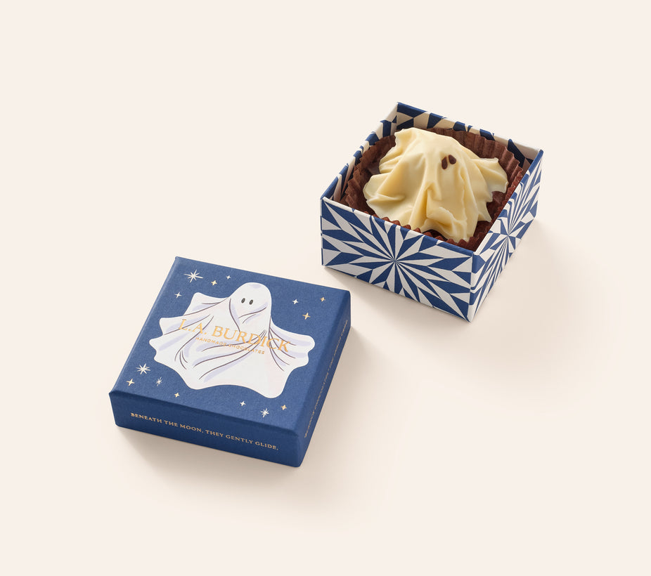 Single white Chocolate Ghost shown inside it's open gift box with ghost illustration.