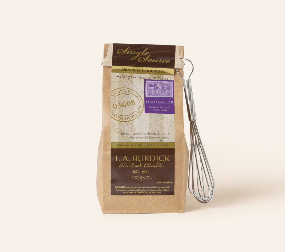 Bag of drinking chocolate on a cream background.