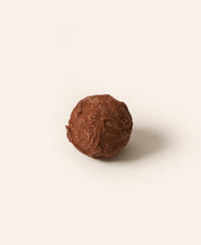 Round, dark chocolate truffle.