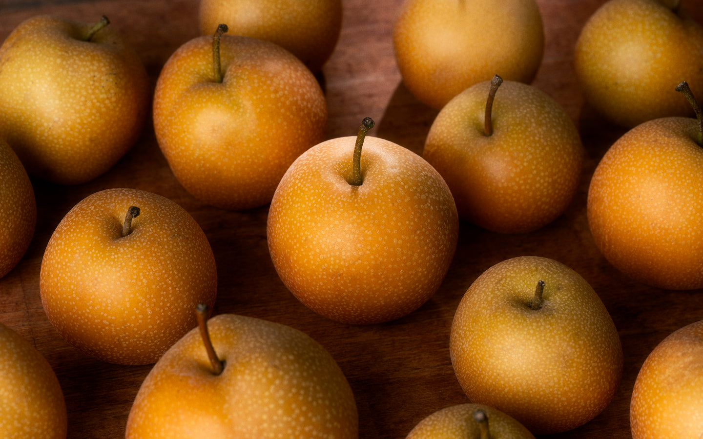Pears on a wooden surface
