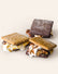 Three s'mores with chocolate and plain graham crackers, showing melting marshmallows and chocolate. 