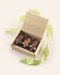Open wooden box containing two Dark Chocolate Elephants and one Milk Chocolate Elephant, with a green satin ribbon