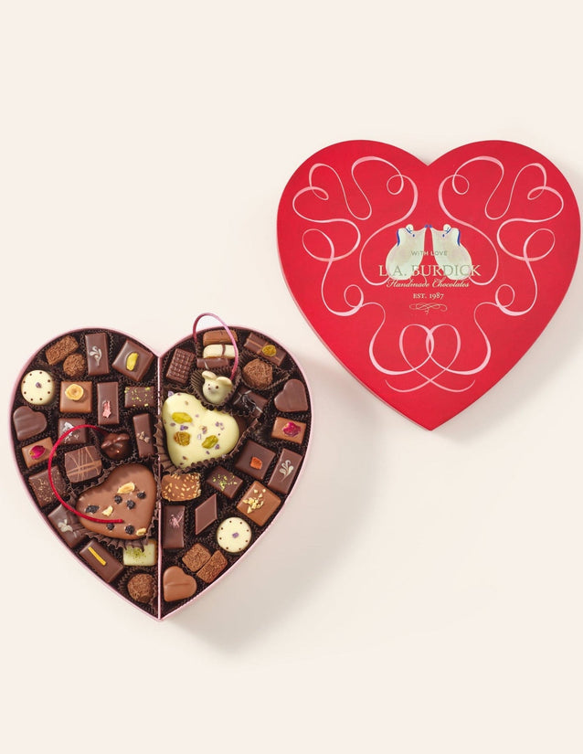 Large heart-shaped box with assorted chocolates, including heart-shaped chocolates and Chocolate Mice.