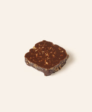 Square dark chocolate bonbon.
