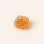 Square gummy candy covered in sugar.
