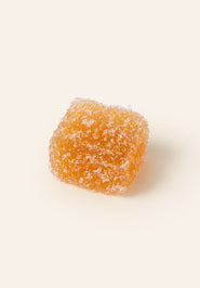 Square gummy candy covered in sugar.